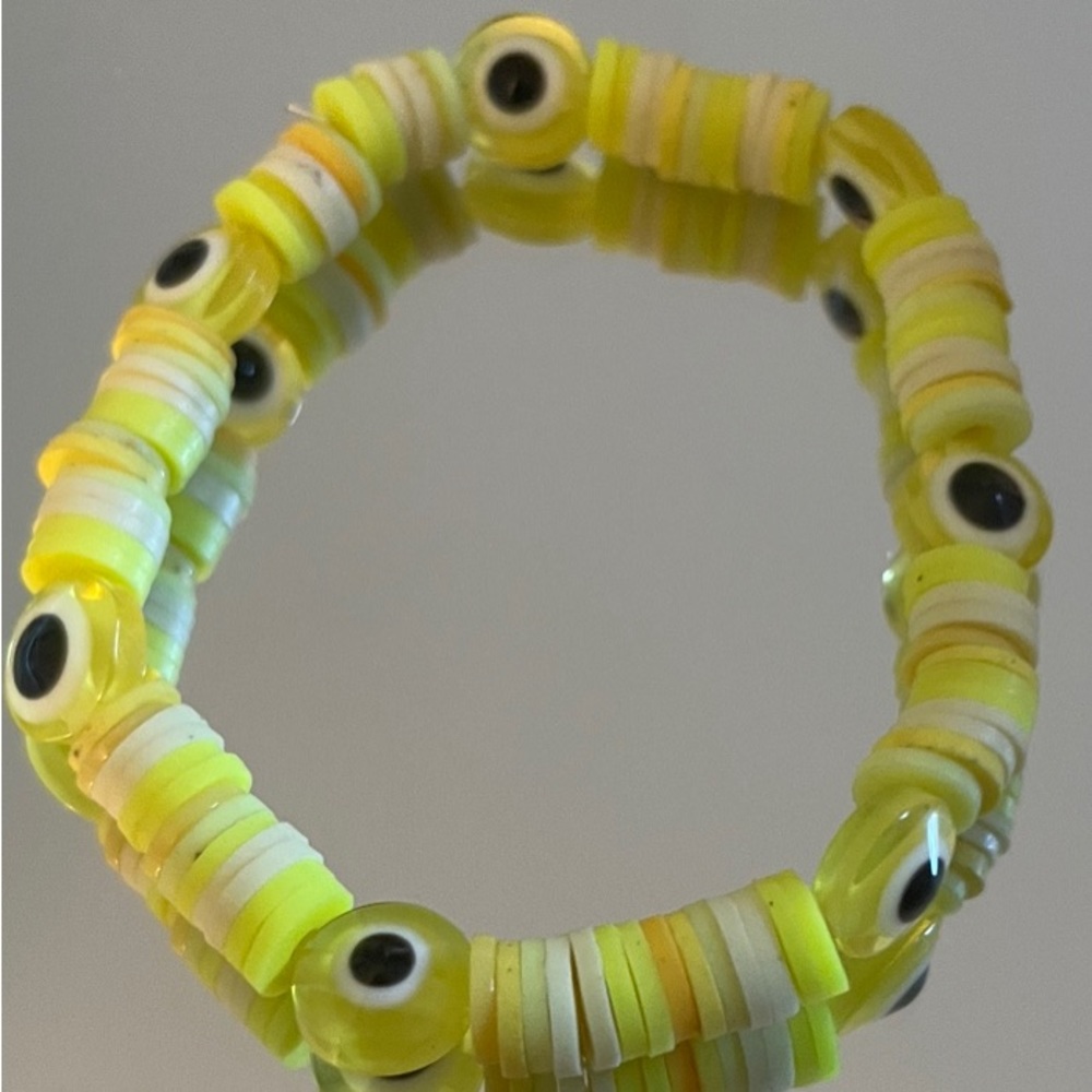Handmade yellow evil eye clay bead bracelet